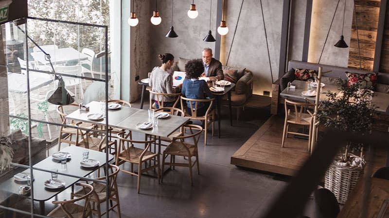 Restaurant dining area shown from an overhead security camera.