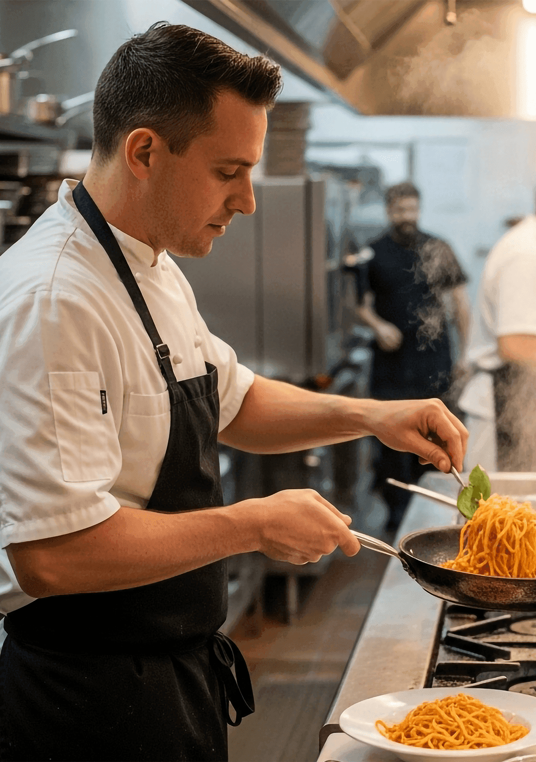 Chef preparing food in a restaurant kitchen